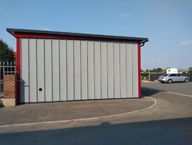 Travaux de peinture sur le préfabriqué de l'école Jean LEBAS